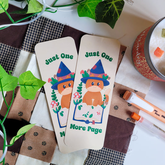 Cute cat witch bookmark featuring the text "Just one more page"