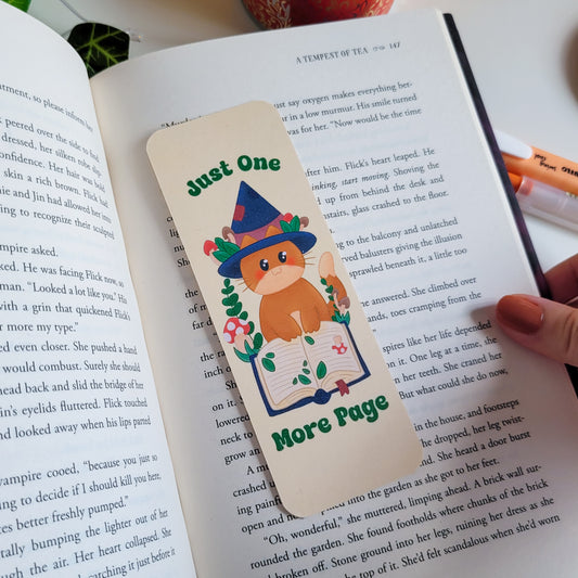 Cute cat witch bookmark featuring the text "Just one more page"