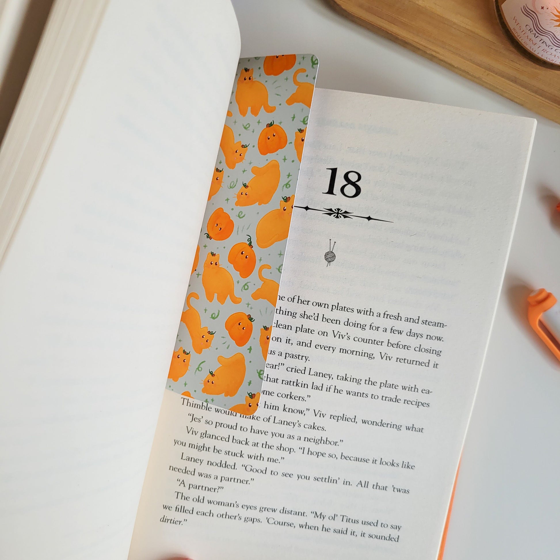 Cute Autumn bookmark featuring cats dressed as pumpkins