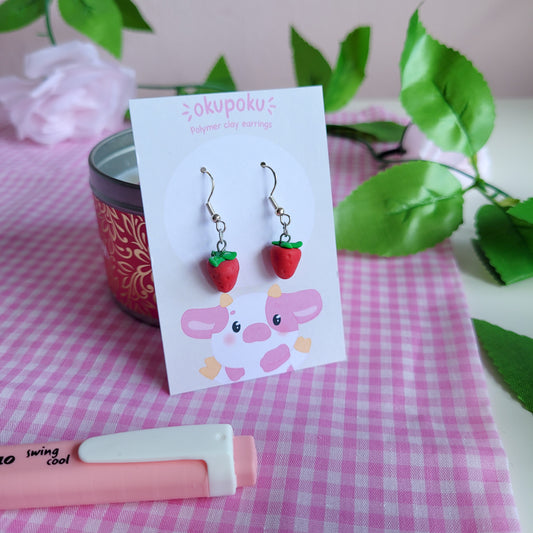 cute strawberry earrings made out of polymer clay